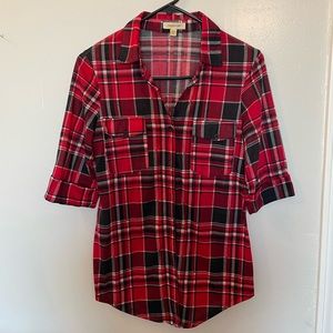 Red plaid flannel three-quarter sleeve shirt.
